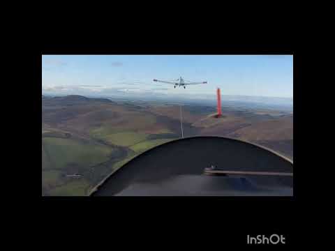 Glider flight above Newton Tors