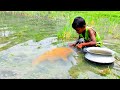amazing hand fishing videos  - Smart boy catching carp fish by hand from mud water part - 35