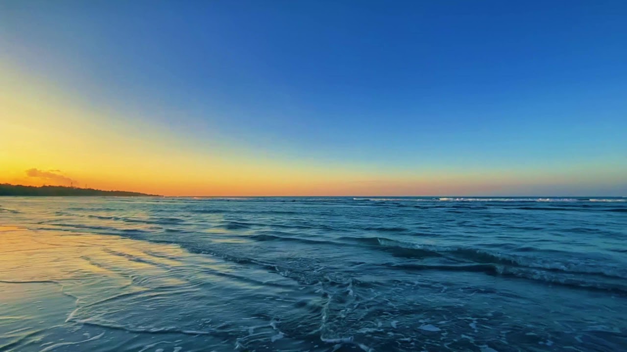 Gentle tidal waves and soft rolling surf guide your mind into deep restorative sleep tonight