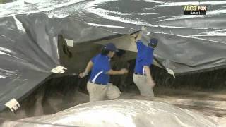 2011/10/08 Grounds crew struggles with tarp