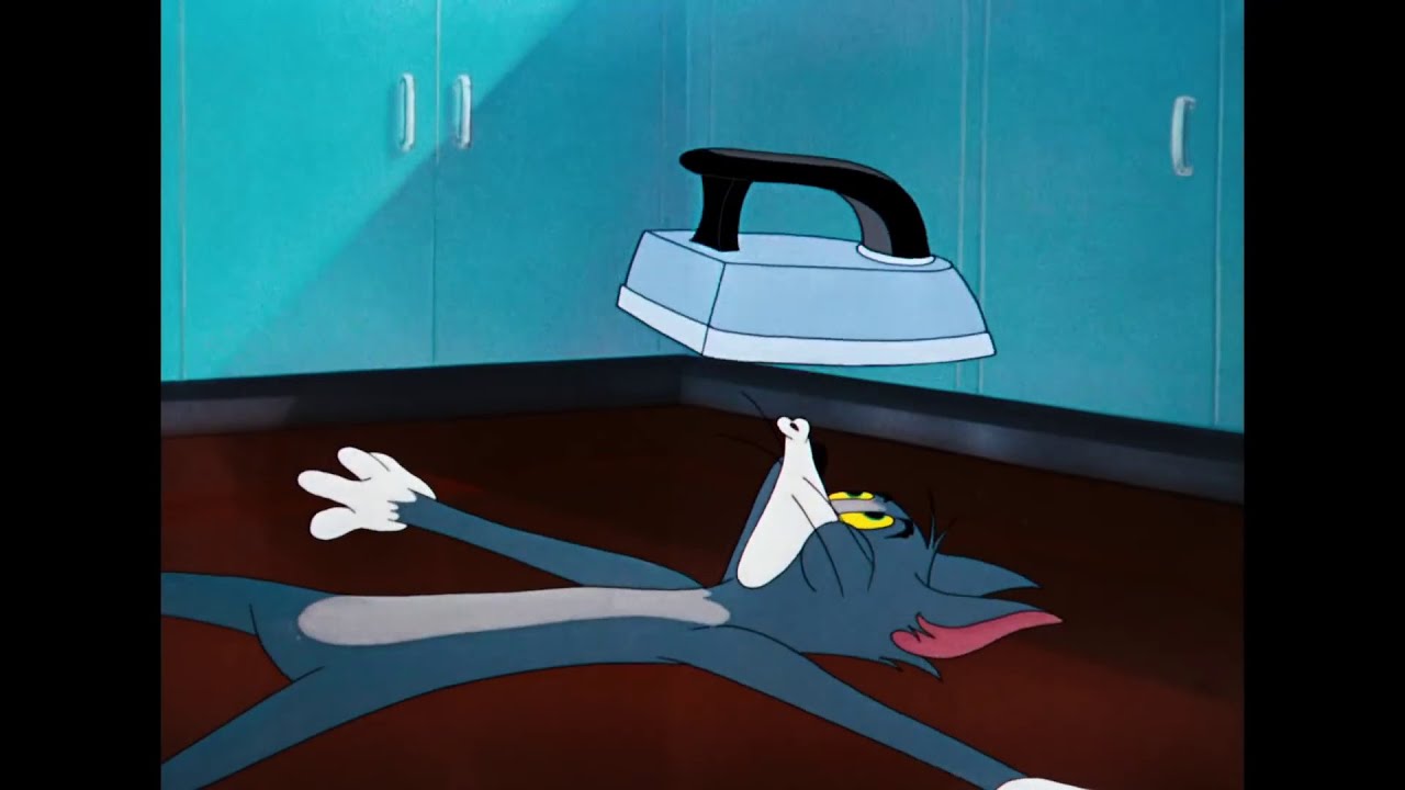 Tom and Jerry 2021 Tom Blows On Iron To Avoid Getting His Face Crushed