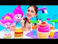 Troller. Poppy için Play Doh oyun hamuru ile külahta dondurma! Kızlar için video