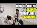 How to defend against grappling  grabbing 1