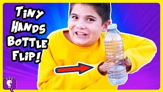 tiny hands challenge throw ball and pick up a coin with hobbykidstv