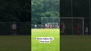 Denis takes the free kick