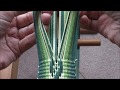 Weaving a patterned band on a floor inkle loom