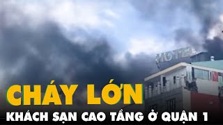 Cháy khách sạn cao tầng ở quận 1, cảnh sát dùng xe thang cứu 3 người