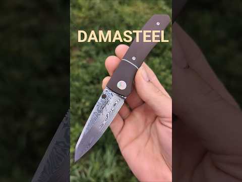Fancy Folder in Damasteel. Spyderco Compression Lock.