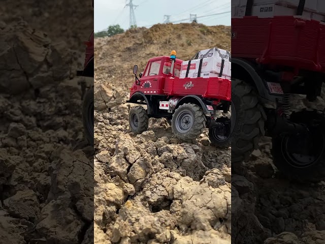 Unimog dominates the rough terrain! 🏞️💪 Start your Monday with some off-road excitement! #rccar