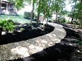 Installing river rock to solve some landscape problems