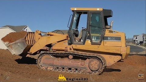 CAT 953C Track Loader Starting a Basement