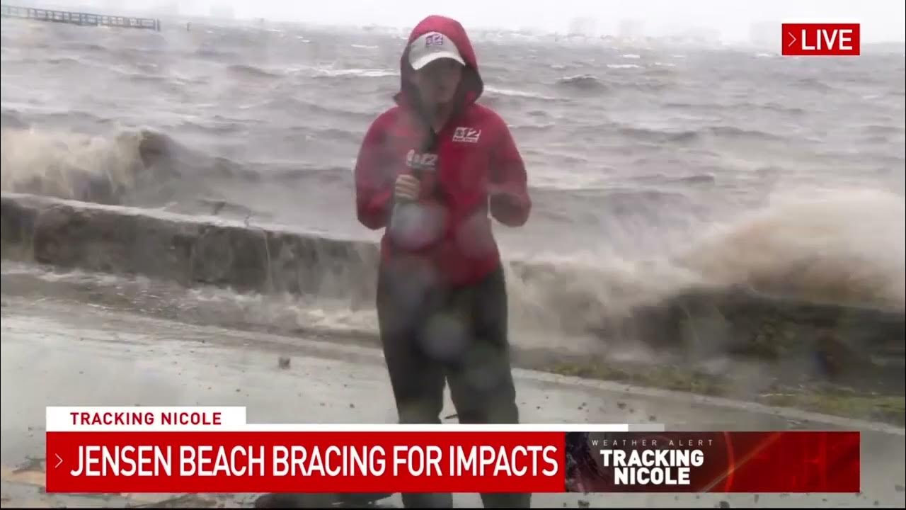 Waves crash over the seawall in Jensen Beach during Tropical Storm