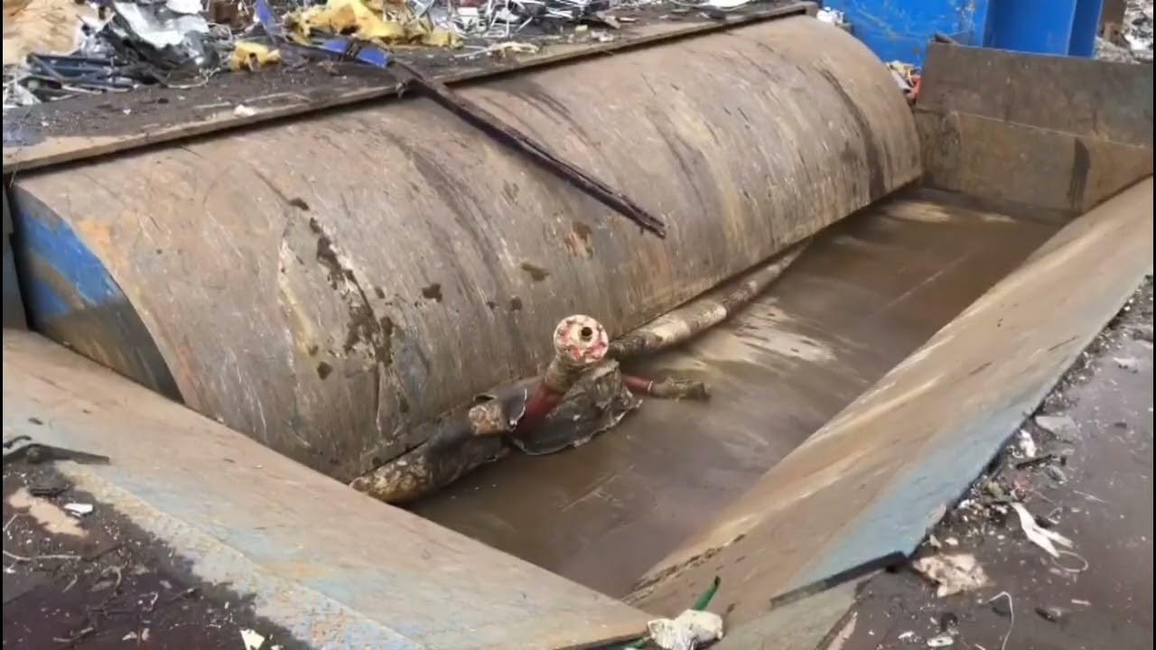 HP1100 MOROS SHEAR shearing a petrol tank at Bradford Waste Traders Ltd