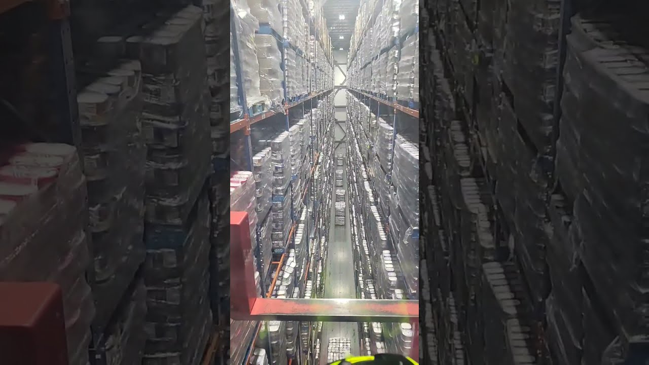 ForkLift Fail Pallet Hanging From Rack