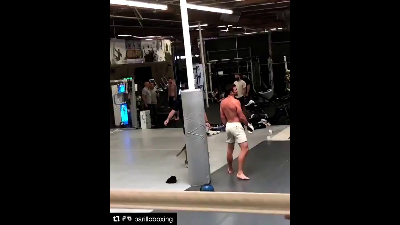 Michael Bisping and Luke Rockhold hugging it out at RVCA gym