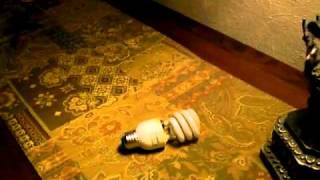 Dangerous, CFLs, compact fluorescent light bulbs burning, catching fire.