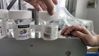 Auto sticker multi sides label applicator for flat oval bottle wrap-around labeling machine