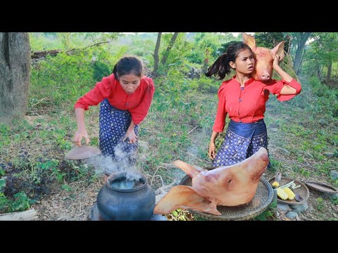 Yummy women found head pig with pineapple for cook - eating delicious