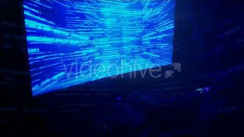 A Man Hacker in a Hood in a Dark Room Works with the Program Code | Stock Footage - Envato elements