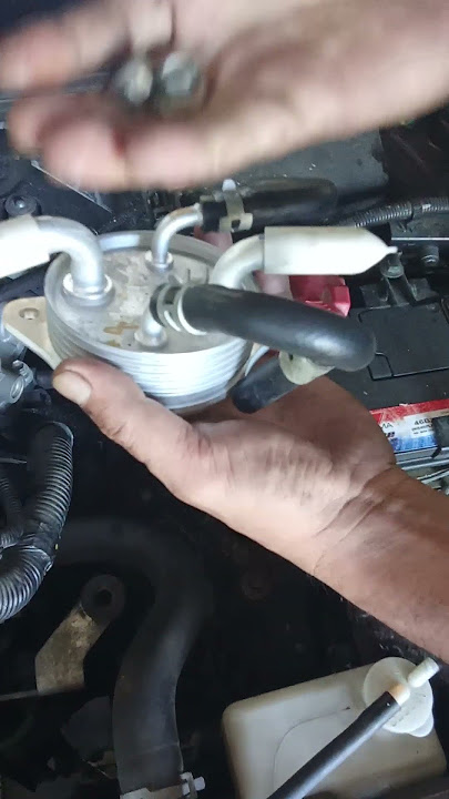 pasang oil cooller produa Bezza yang baru.