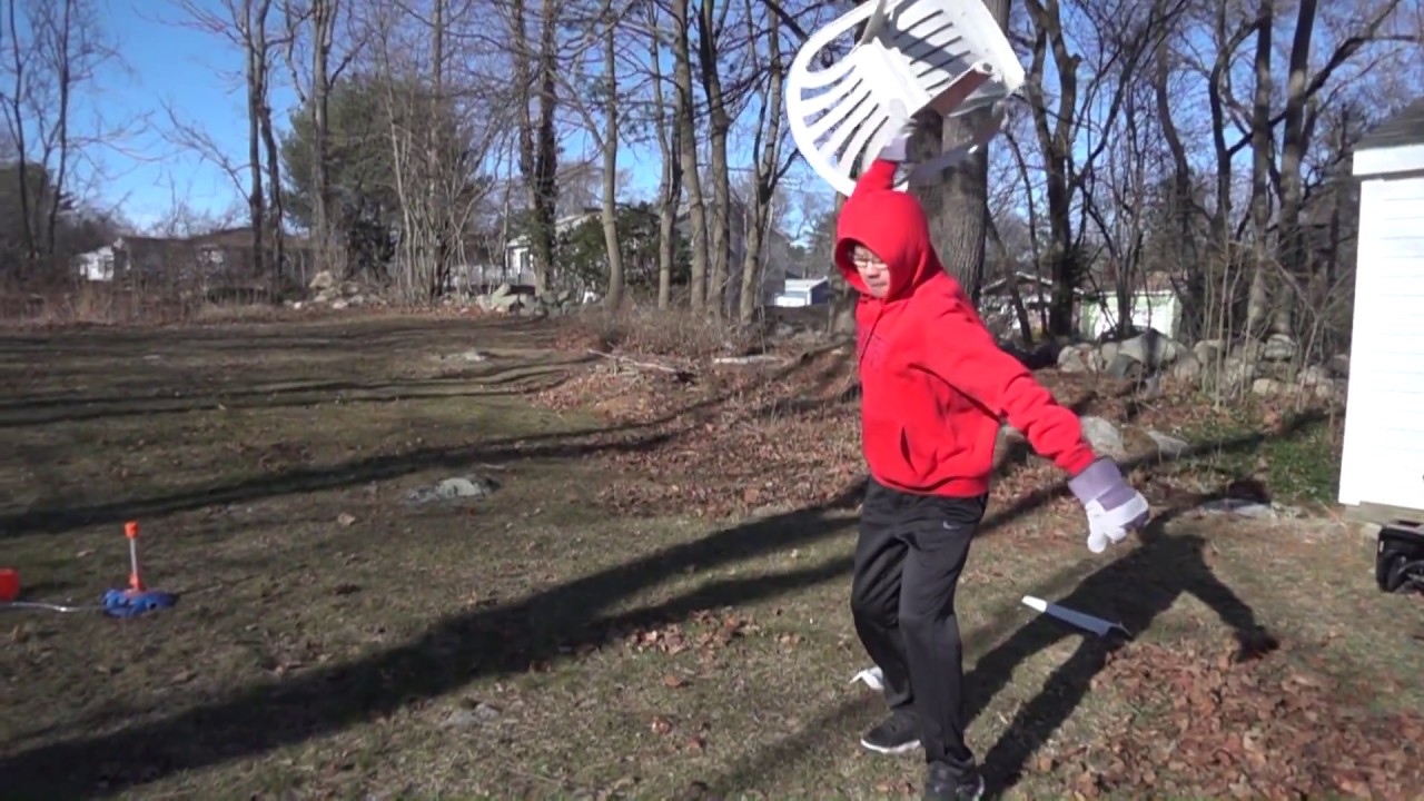 Slow motion - Breaking a broken plastic chair
