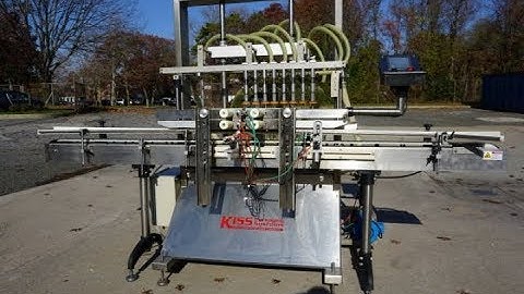 Accutek Eight Head Automatic Filling Machine