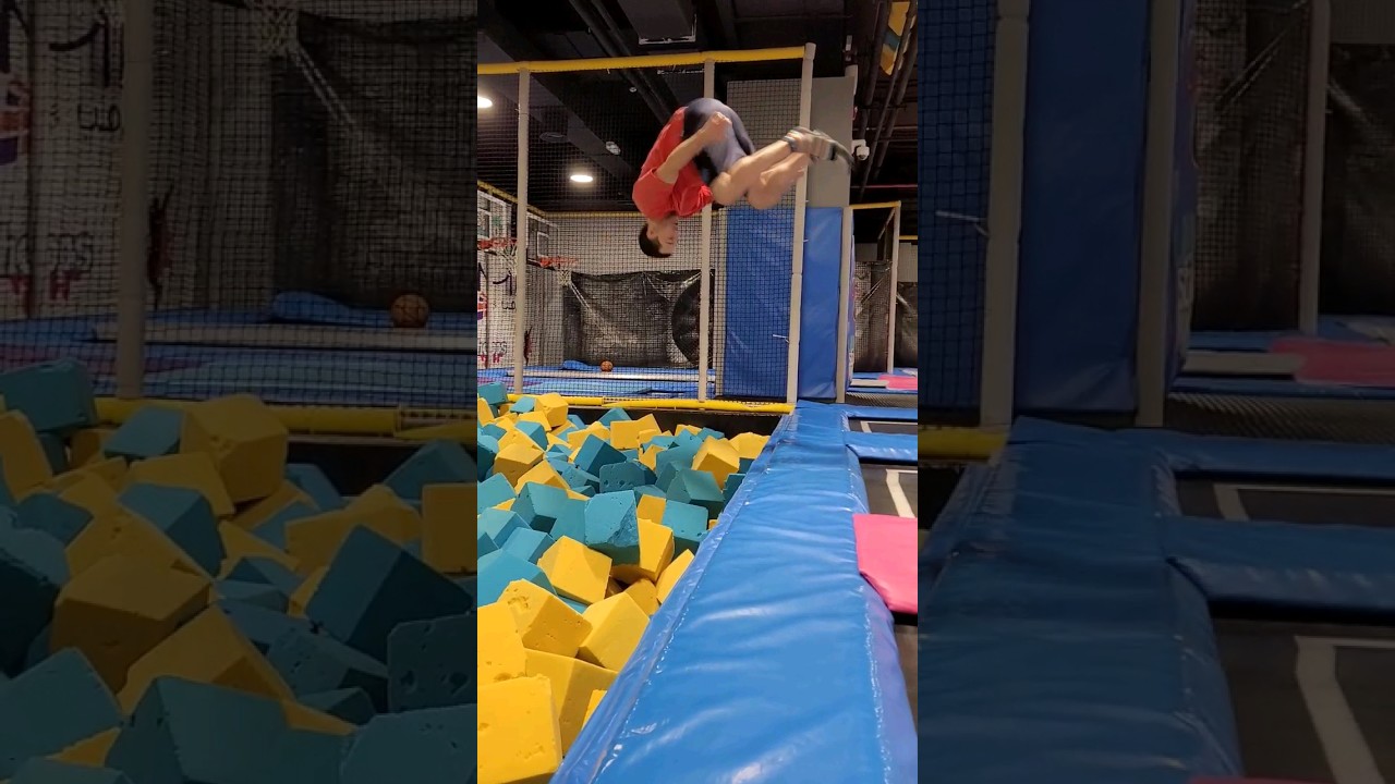 Dad bod jumping into a foam pit. 