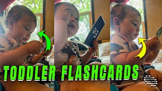 Precious Toddler Playing with Flashcards With Mom