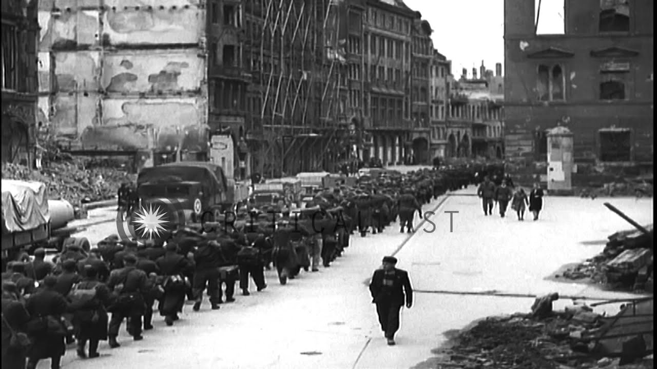 United States Army soldiers marching German prisoners through Munich City HD Stock Footage