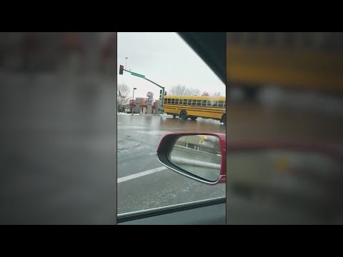 School bus slides down icy road in Minnesota
