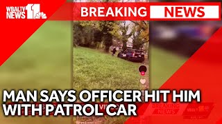 WBAL-TV 11 News interviews man seen in viral video who says an officer hit him with a patrol car