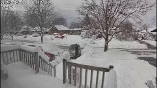 Man Attempting to Clear Snow Falls Down - 1554257