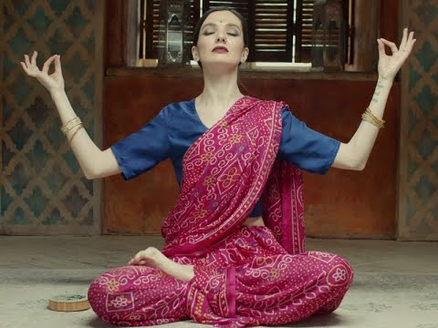 woman doing yoga in a hindu dress | Tech Gali