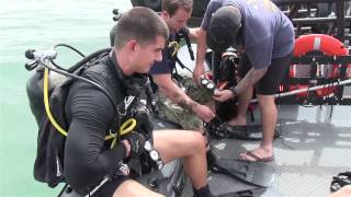 U.S. Navy EOD Divers Perform Force Protection Inspection Dive