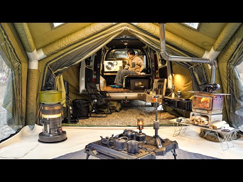 INFLATABLE TENT DOCKED TO TRUCK. WINTER CAMPING in the RAIN