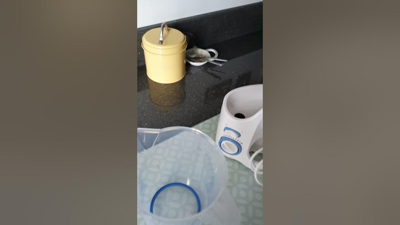 Stuck button on Waterpik water flosser YouTube