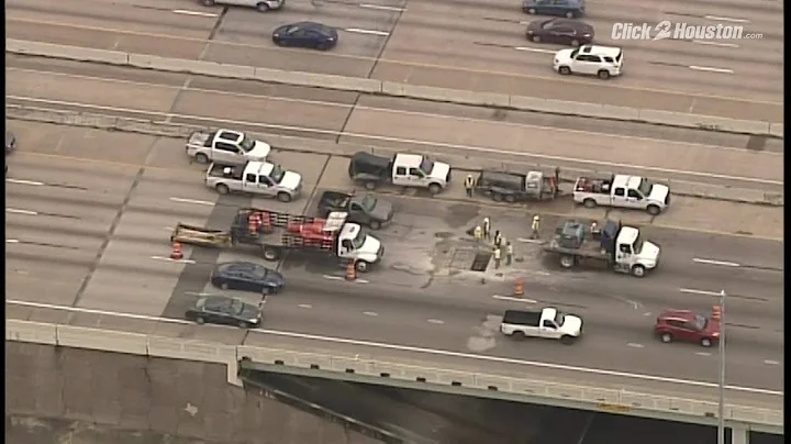 Workers repairing huge pothole in north Houston