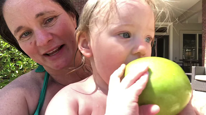 Loving apples by the pool