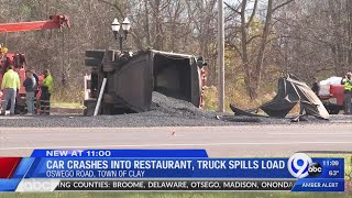 Car crashes into restaurant, truck spills load