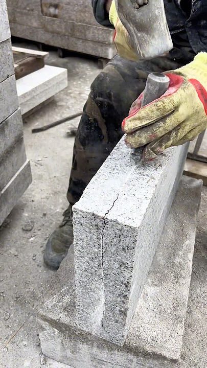 Chiseling a natural face on grey granit with years of hands-on experience 🔨🪨💯