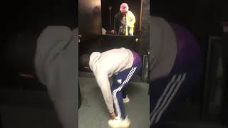 Guy jumps into top half of opened Dutch door and bumps his head
