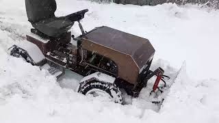:    4x4. .snow removal with a homemade minitractor.