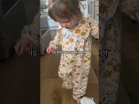 Mom learns that her toddler took her diaper off and it's stuck around her ankle!