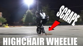 Motorcycle Stunt Mania Greg doing a highchair wheelie almost wrecking his bike