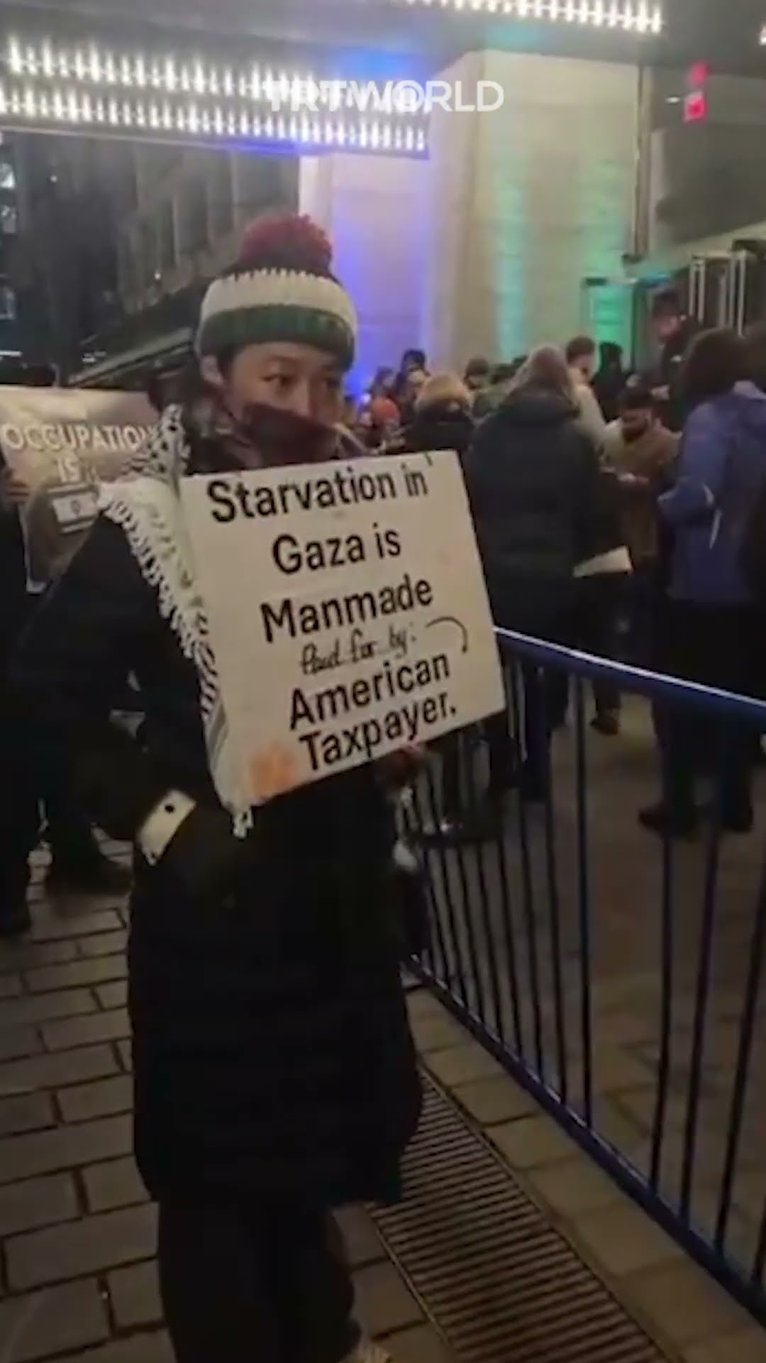 Activists stage protest outside Obama, Merkel event
