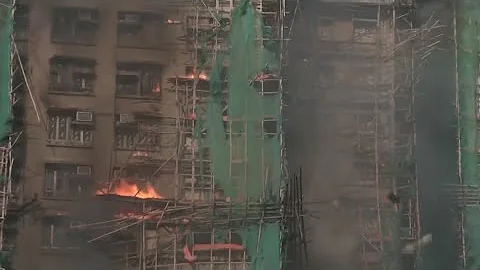 Massive fire breaks out a multiple high-rise apartments in Hong Kong