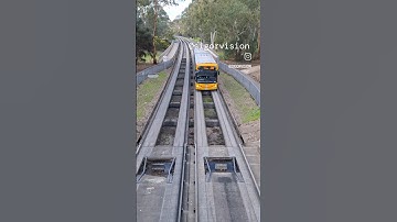 Bus is changing from the "rails" to the road on Adelaide Bus o-bahn Australia
