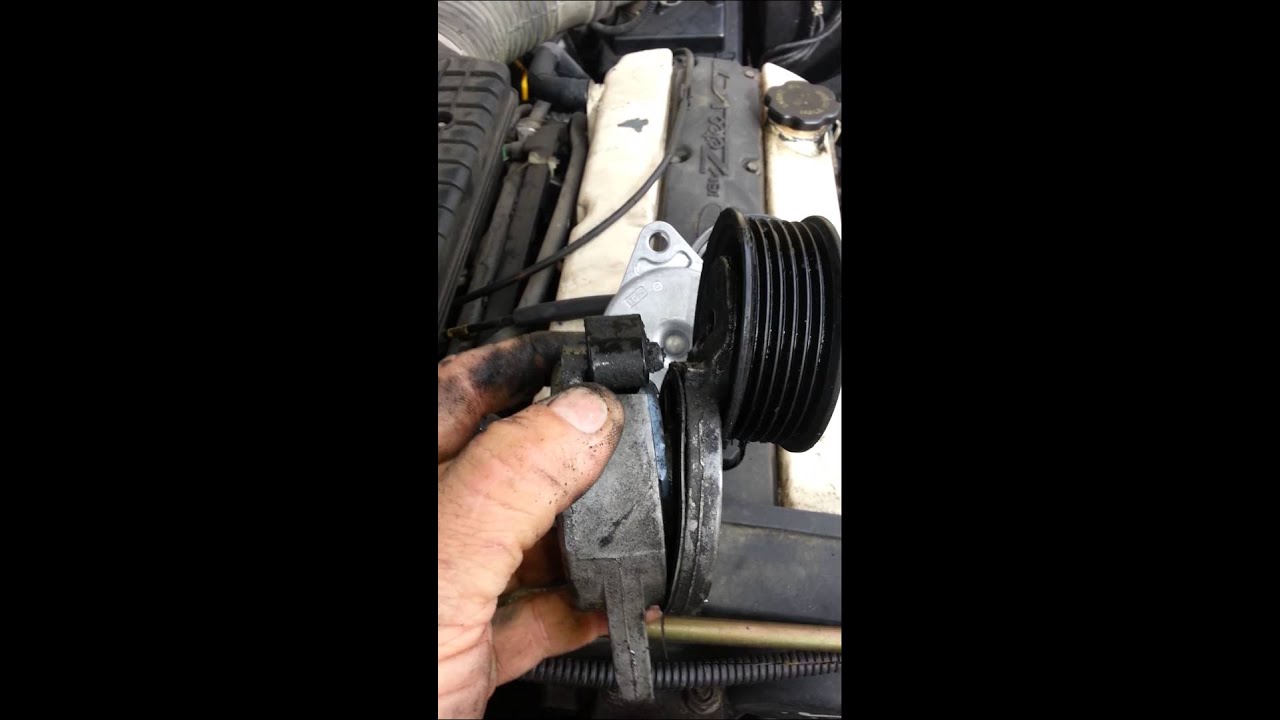 Ford contour 2.0 belt tensioner replacement - YouTube