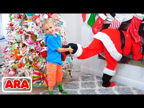 فيديو: أقواس شجرة عيد الميلاد (68 صورة): من شريط الساتان والورق والأورجانزا. شجرة عيد الميلاد مزينة بالكرات والأقواس. انحنى على القمة وعلى الأغصان