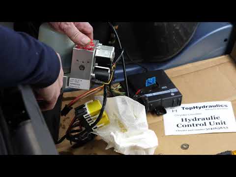 How to Replace the Hydraulic Pump and Tonneau Cylinder - Chrysler Crossfire - Top Hydraulics, Inc.